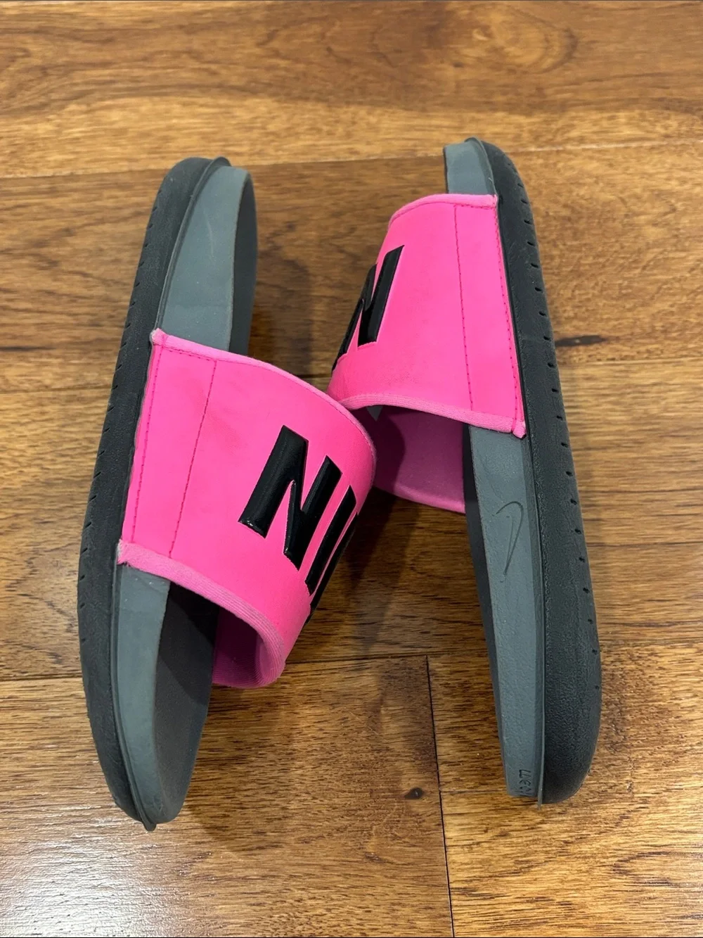 Nike Women’s Pink and Gray Slide Sandals with Bold Logo